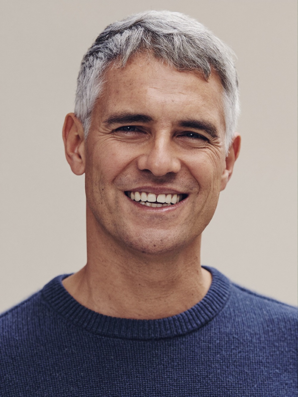 Confident man in his late fifties with a healthy natural smile